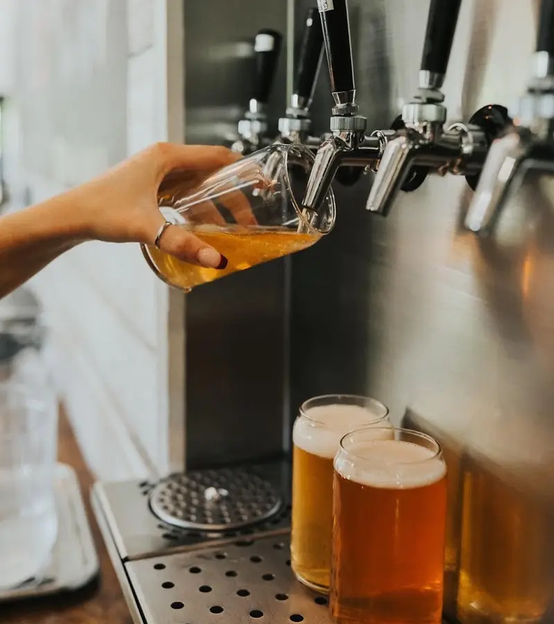 Beer being poured from the taps