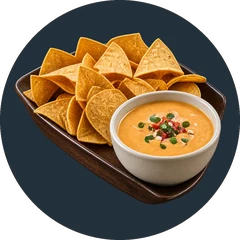 A tray of tortilla chips beside a bowl of queso topped with pico de gallo and jalapeño