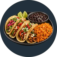 Four tacos on a platter with a bowl of black beans and a serving of Mexican rice